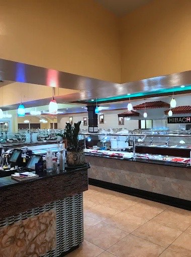 Buffet stations and the hibachi counter under the arched ceiling
